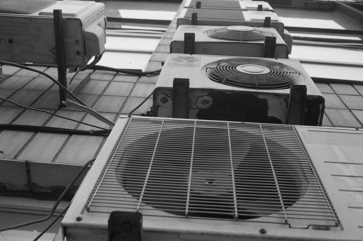 Rooftop air-conditioning units on a commercial building.